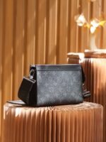 The Poch ette Voyage at Louis Vuitton M81124 Black Flower House