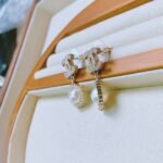 CHANEL temperament sunflower rotating pearl round earrings - Image 6